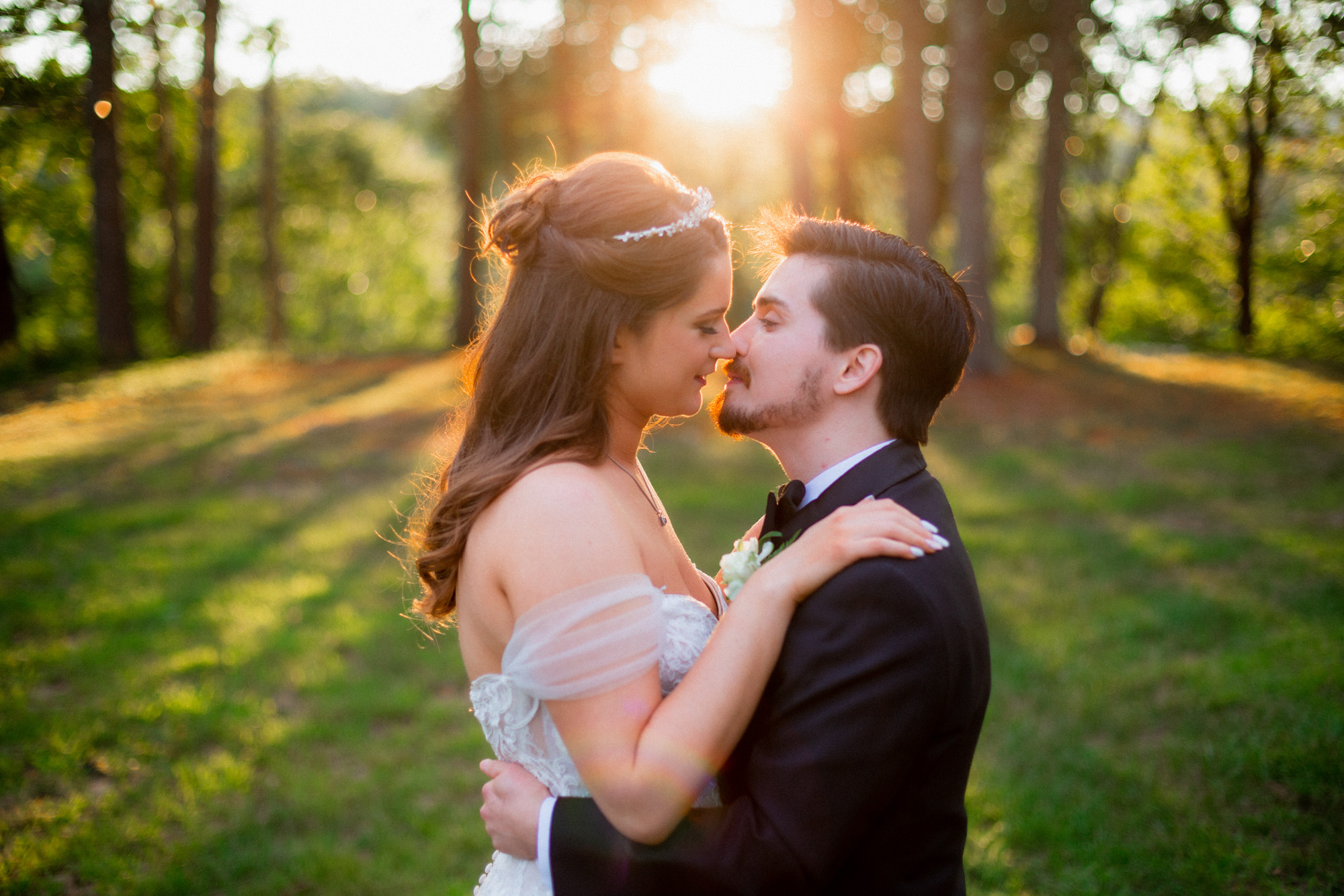 wedding portrait of couple almost kissing at sunset. Located at Bishop Farm, NH and photographed by Chiha Studios