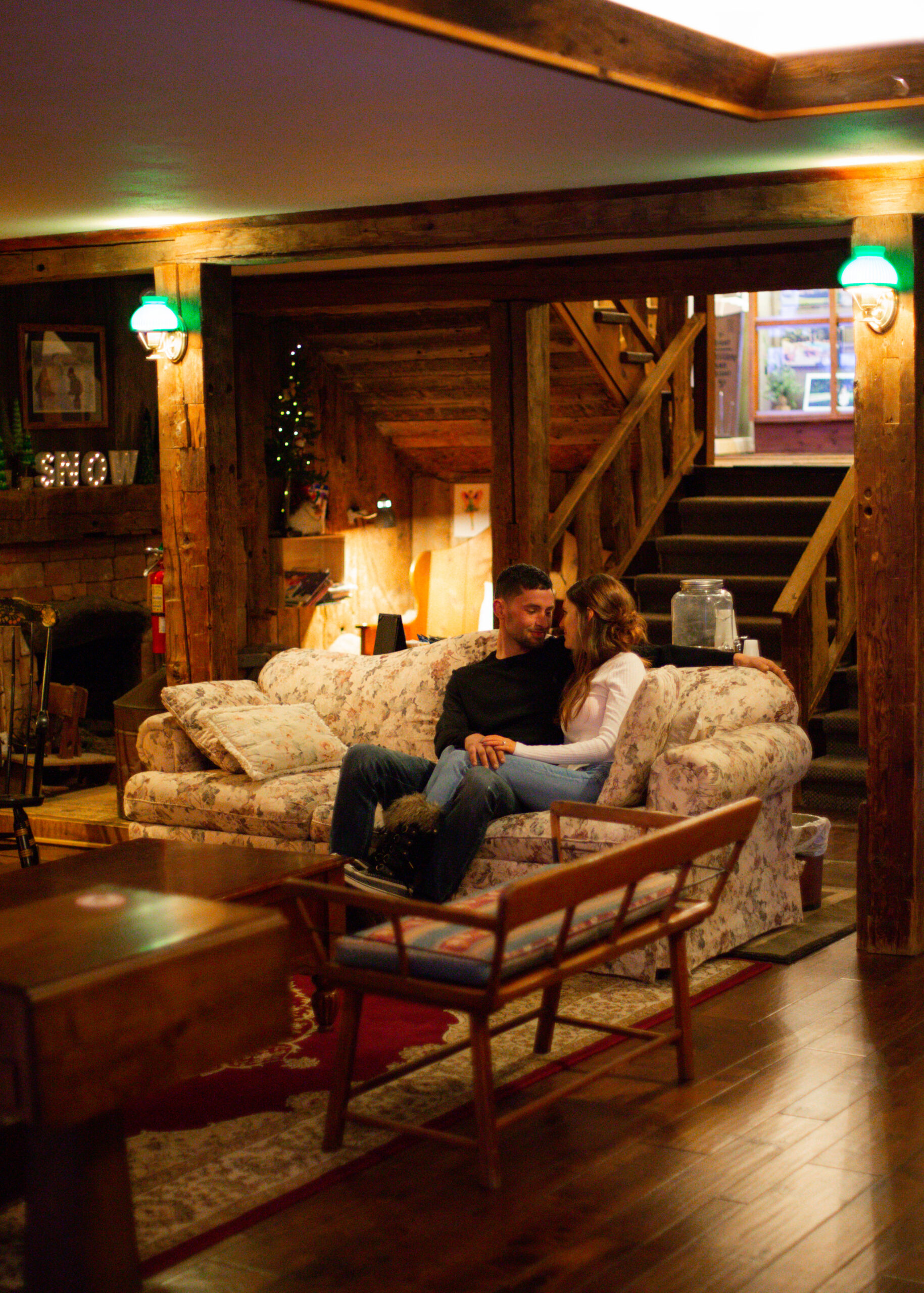 indoor engagement photos at a mountain lodge in killington vermont